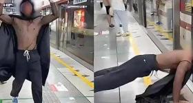 杭州地铁一男子爬进车厢吓跑乘客